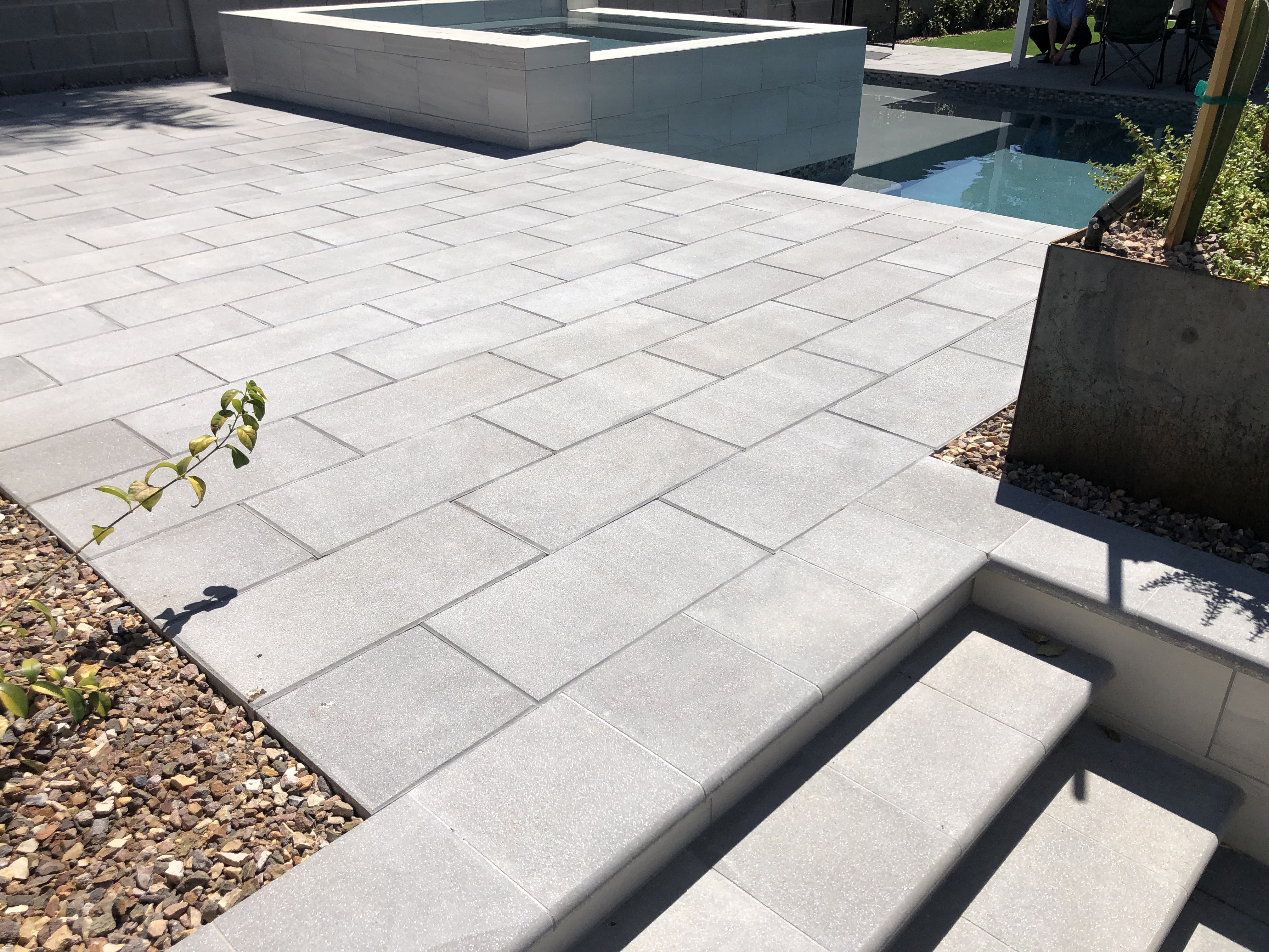 Prolok Design & Build Ltd. - Here you can see the beautiful transition  between the different Melville pavers. Products used: - Melville Plank  Pavers 80 mm - Range Newport Grey - Melville